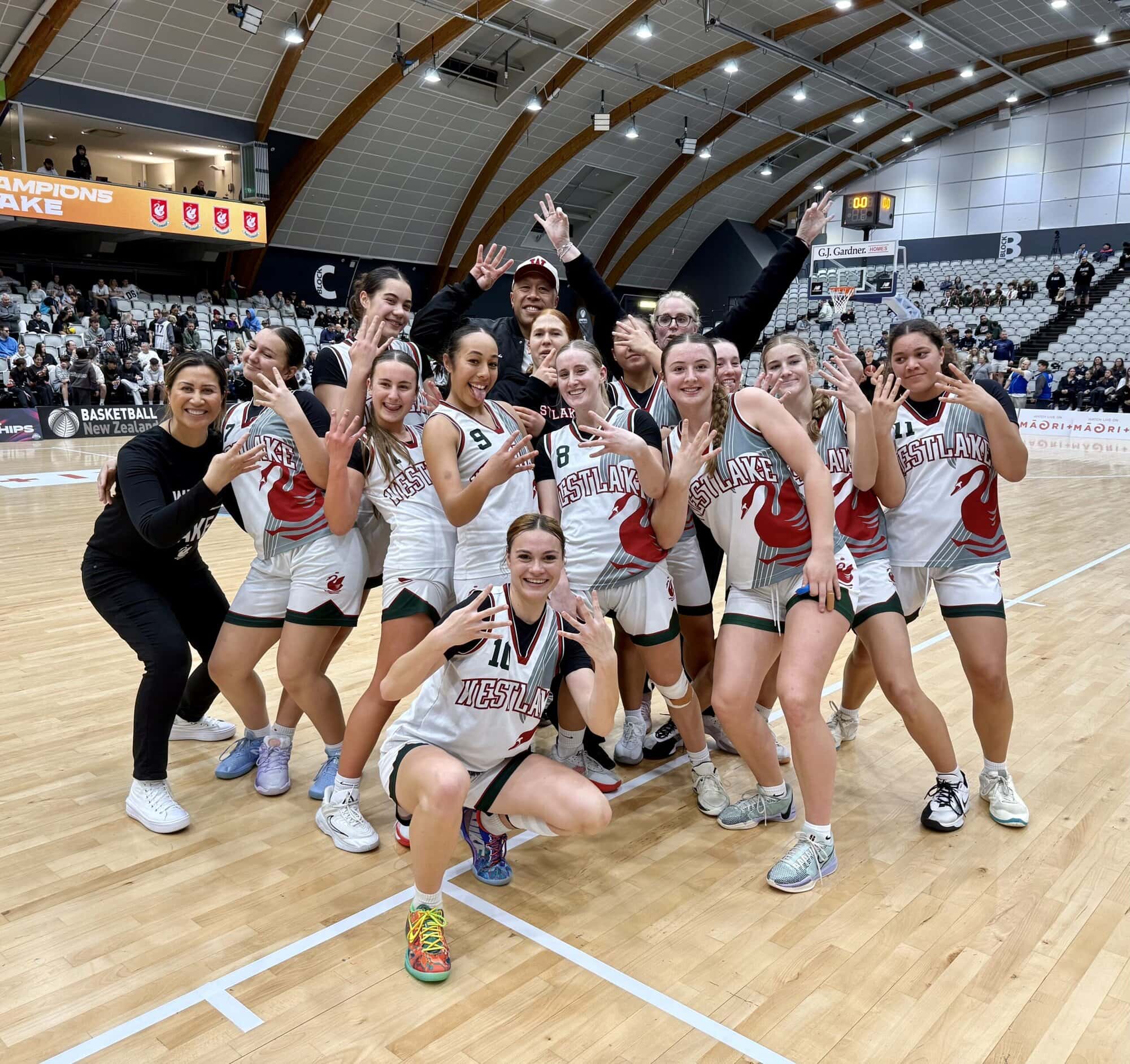 Basketball champs again Basketball champs again