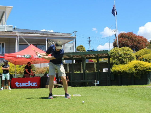 Associate Principal David Burton teeing off on the Tuckr sponsored hole