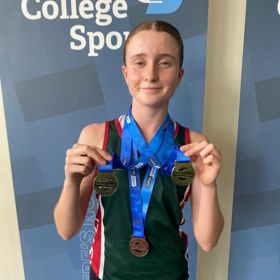 Maddie Anderson with three of her medals!