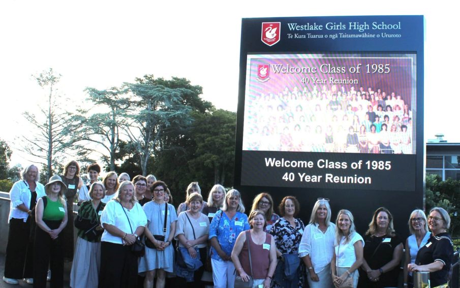 Class of 1985 reunion by front sign